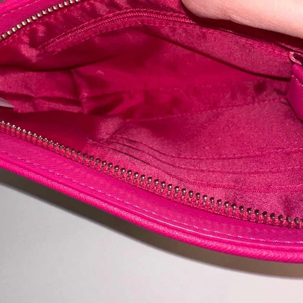 Vera Bradley Pink and White Laser Cut Floral Wristlet.